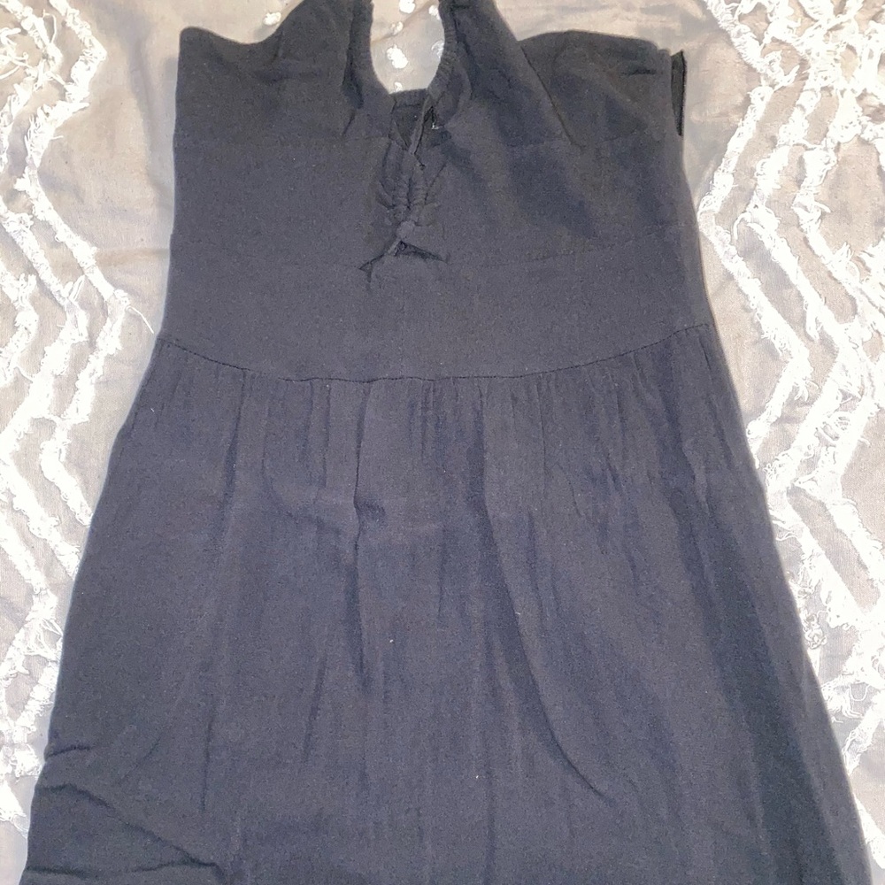 Black halter tie at neck